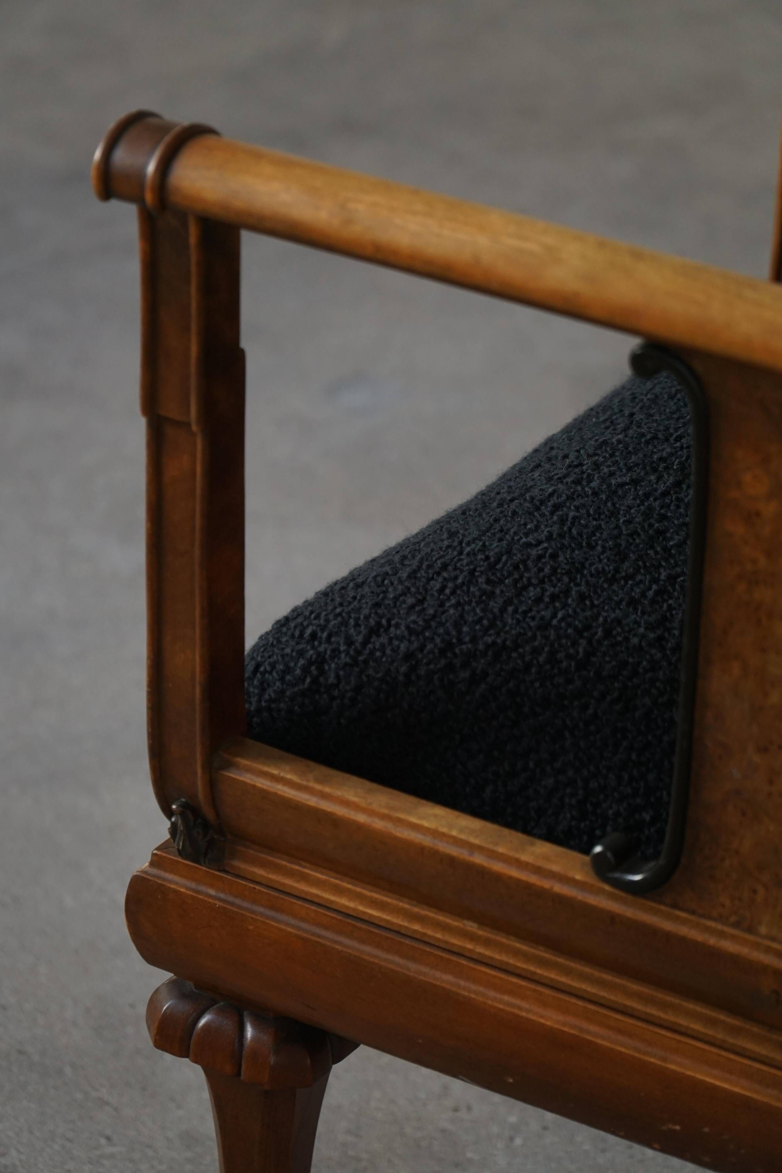 Early 20th century Danish Art Nouveau armchair, reupholstered in charcoal boucle.