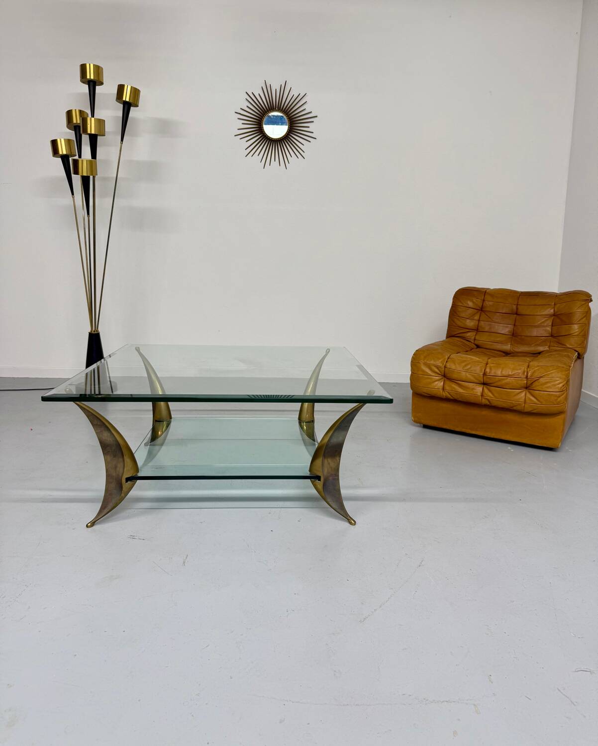 Glass coffee table with solid brass legs, Italian design from the 60s