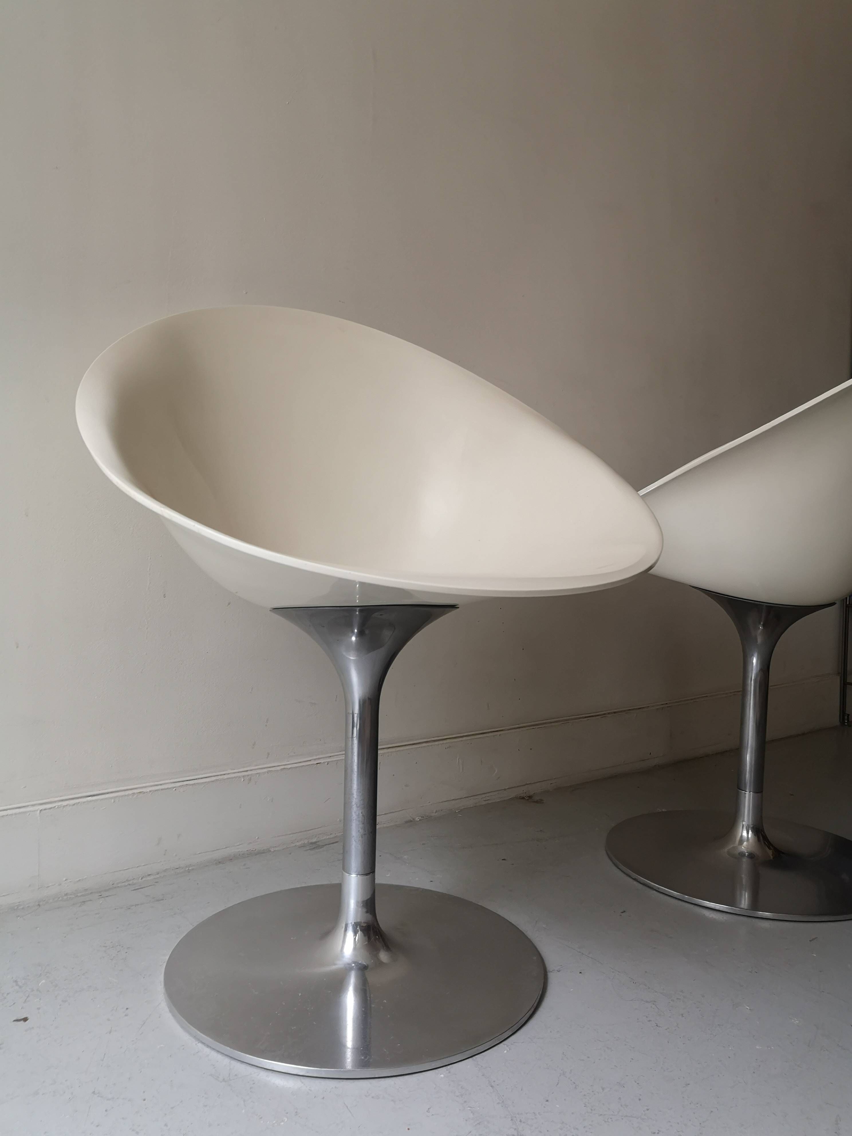 Ero swivel armchair in metal and white shell, p. starck design for kartell