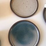 Lot 7 cups and saucers sandstone by Roger Jacques