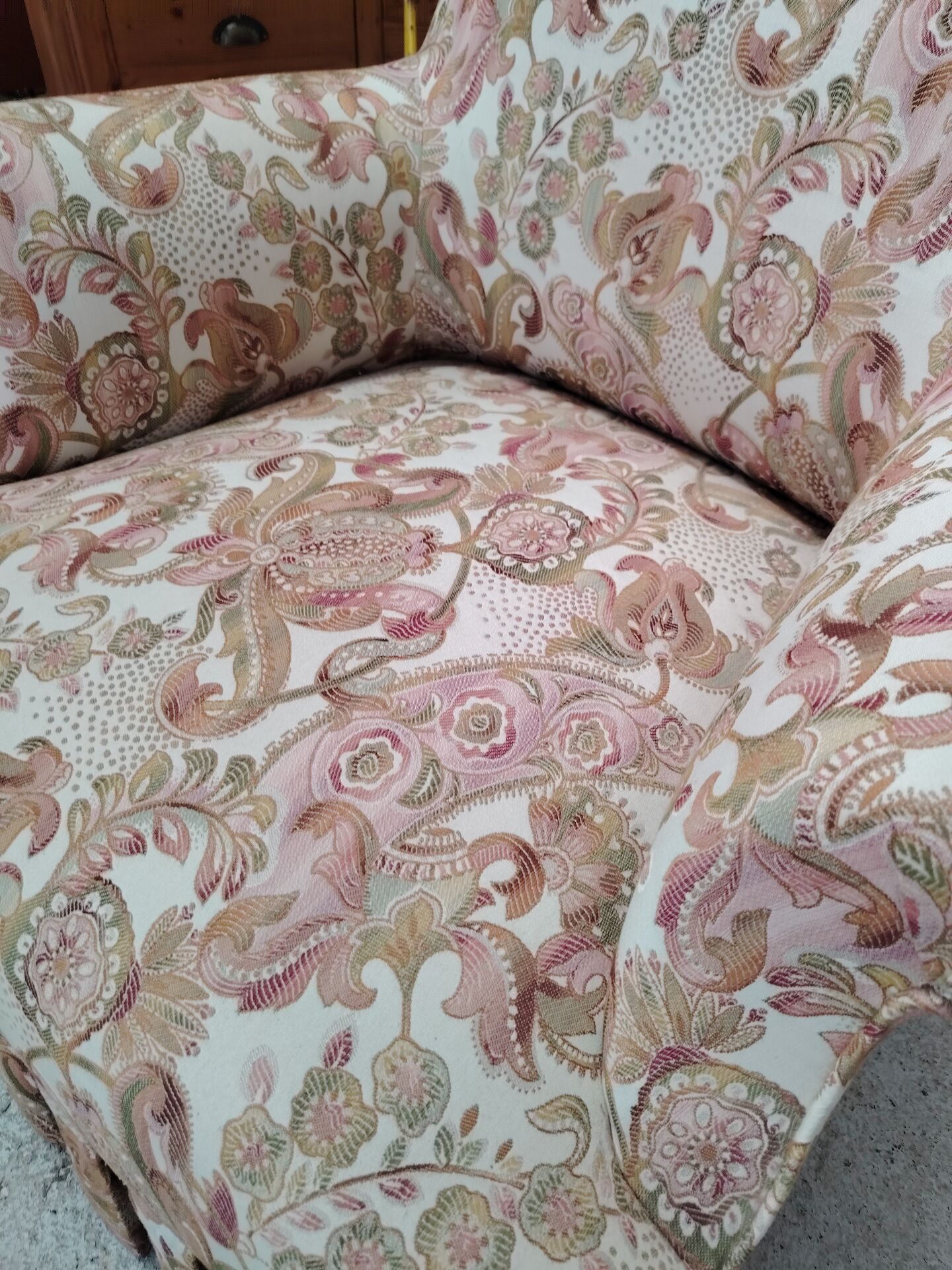 Antique armchair fully restored with brass wheels.