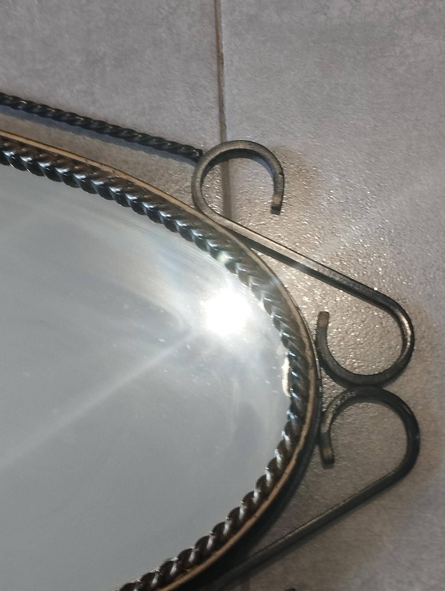 Mid-century modern iron mirror, brutalist, vintage organic, thick sixties.