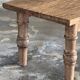 Brown Indonesian teak coffee table, with a border and cylindrical legs H40 L103.