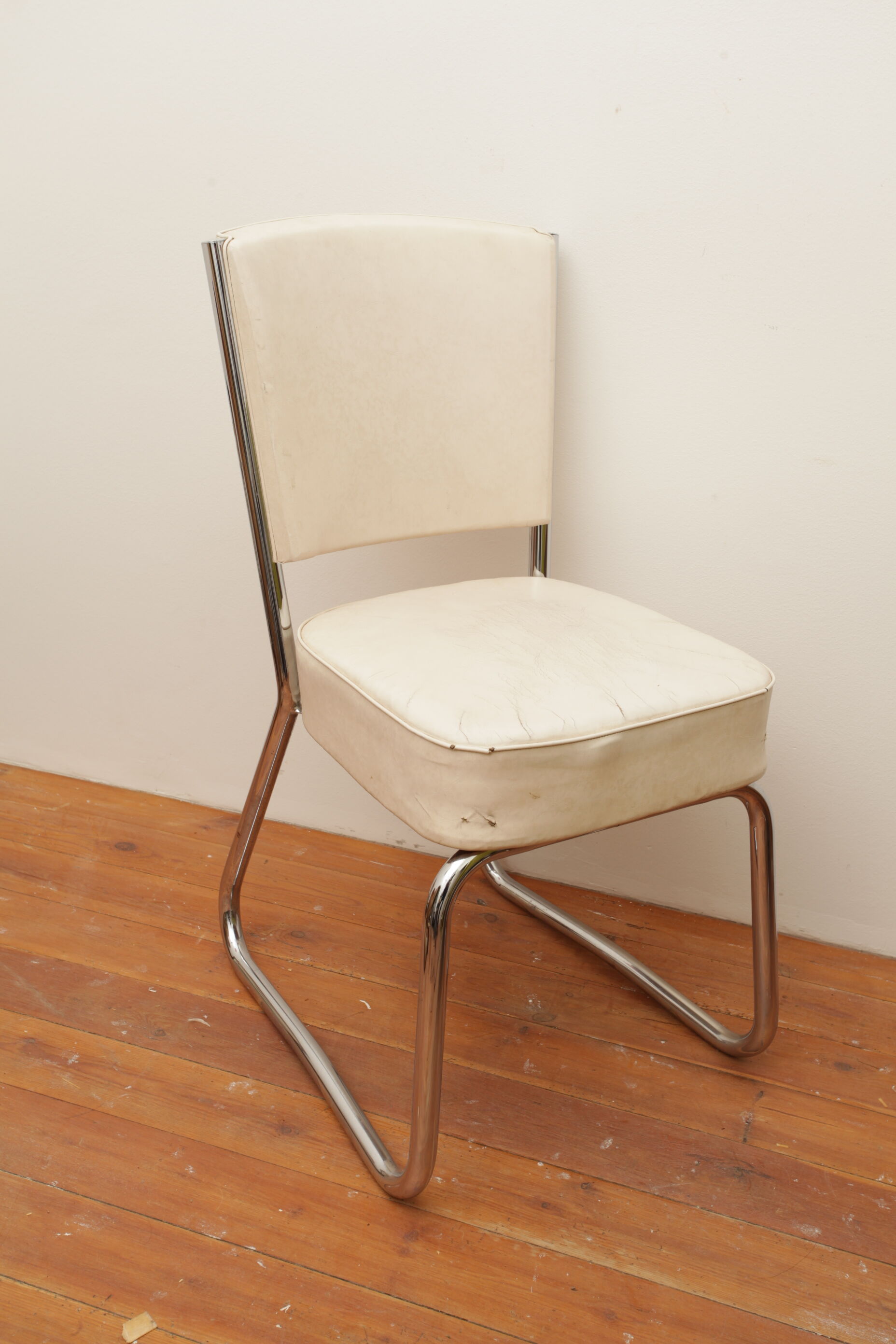 Fauteuil skaï blanc
