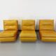 Suite de 3 chauffeuses Roche Bobois vintage en cuir jaune moutarde années 70