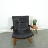 Fauteuil de lecture noir avec accoudoirs et support en bois