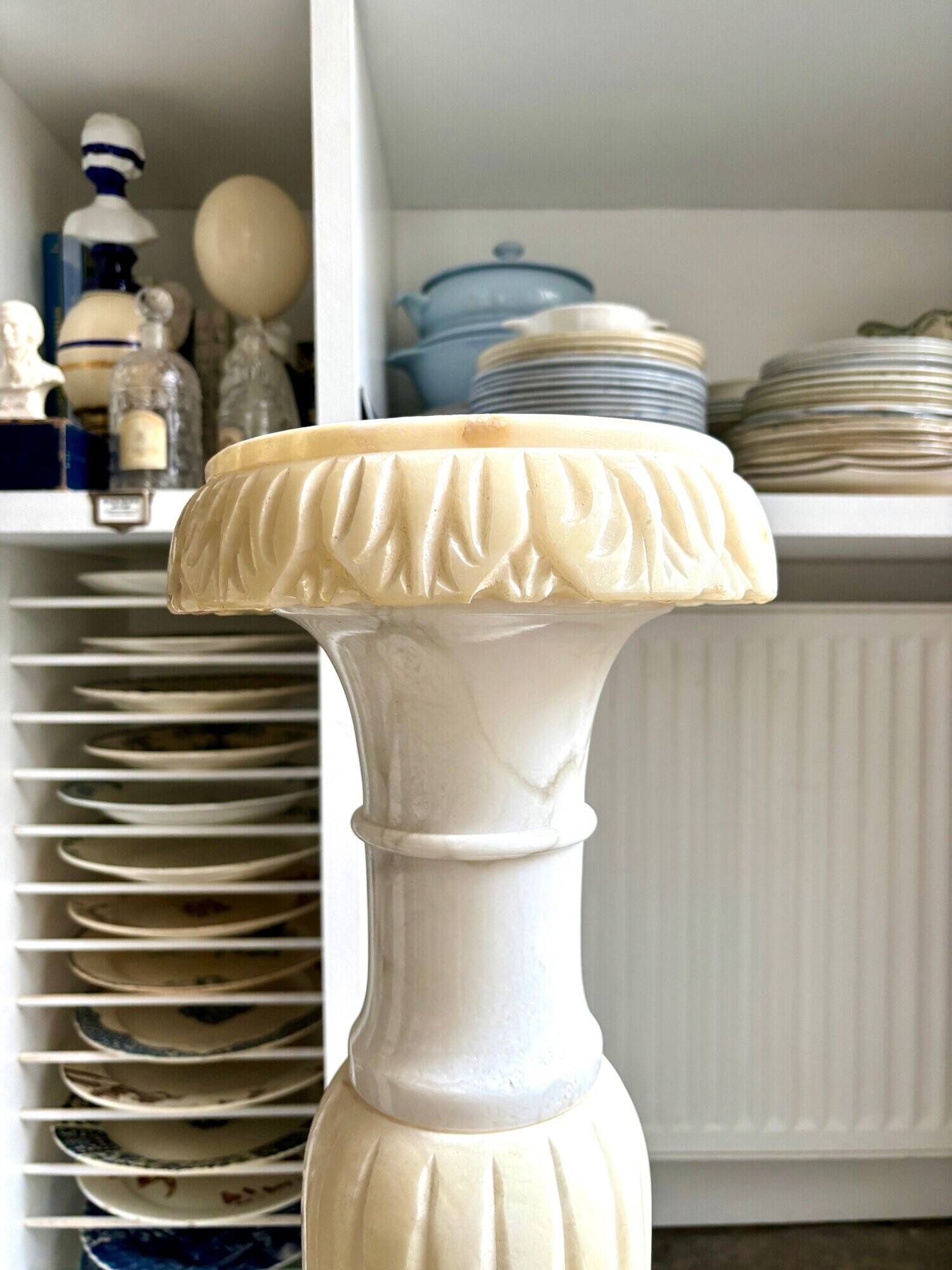 Column, illuminated alabaster saddle