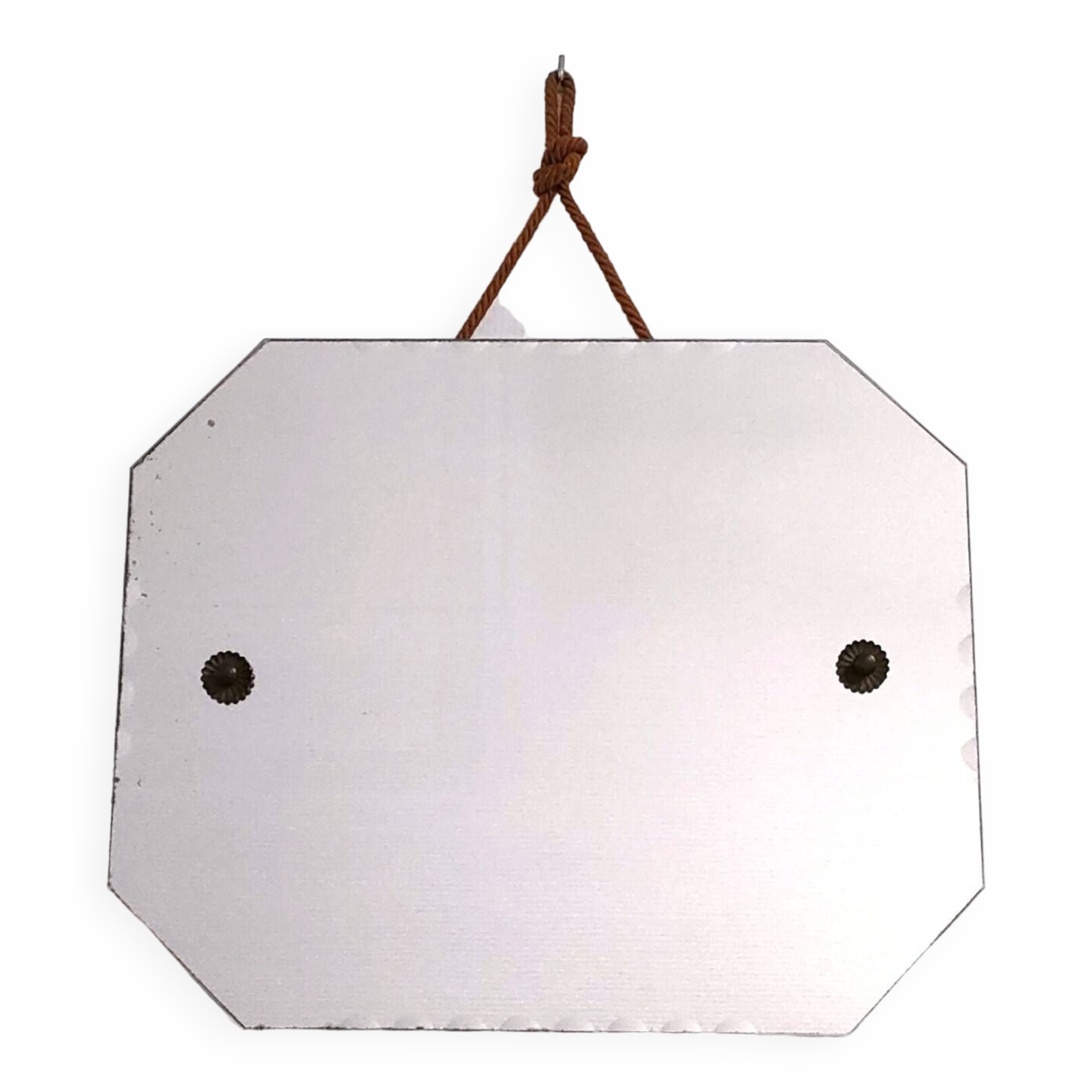 Octagonal mirror with brass hubcaps from the 60s