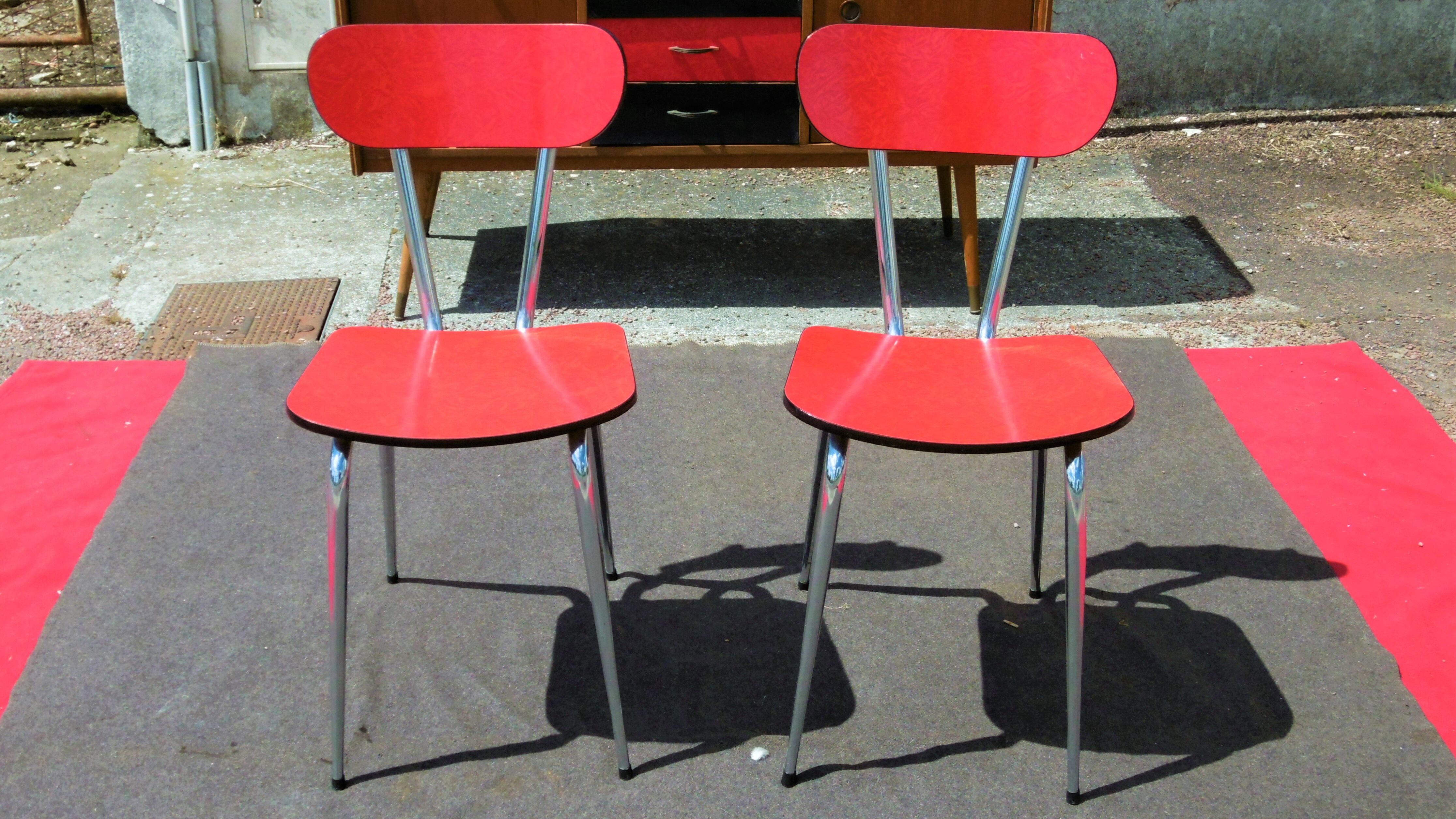 Red formica table and two chairs