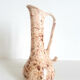 Vintage ceramic pourer signed