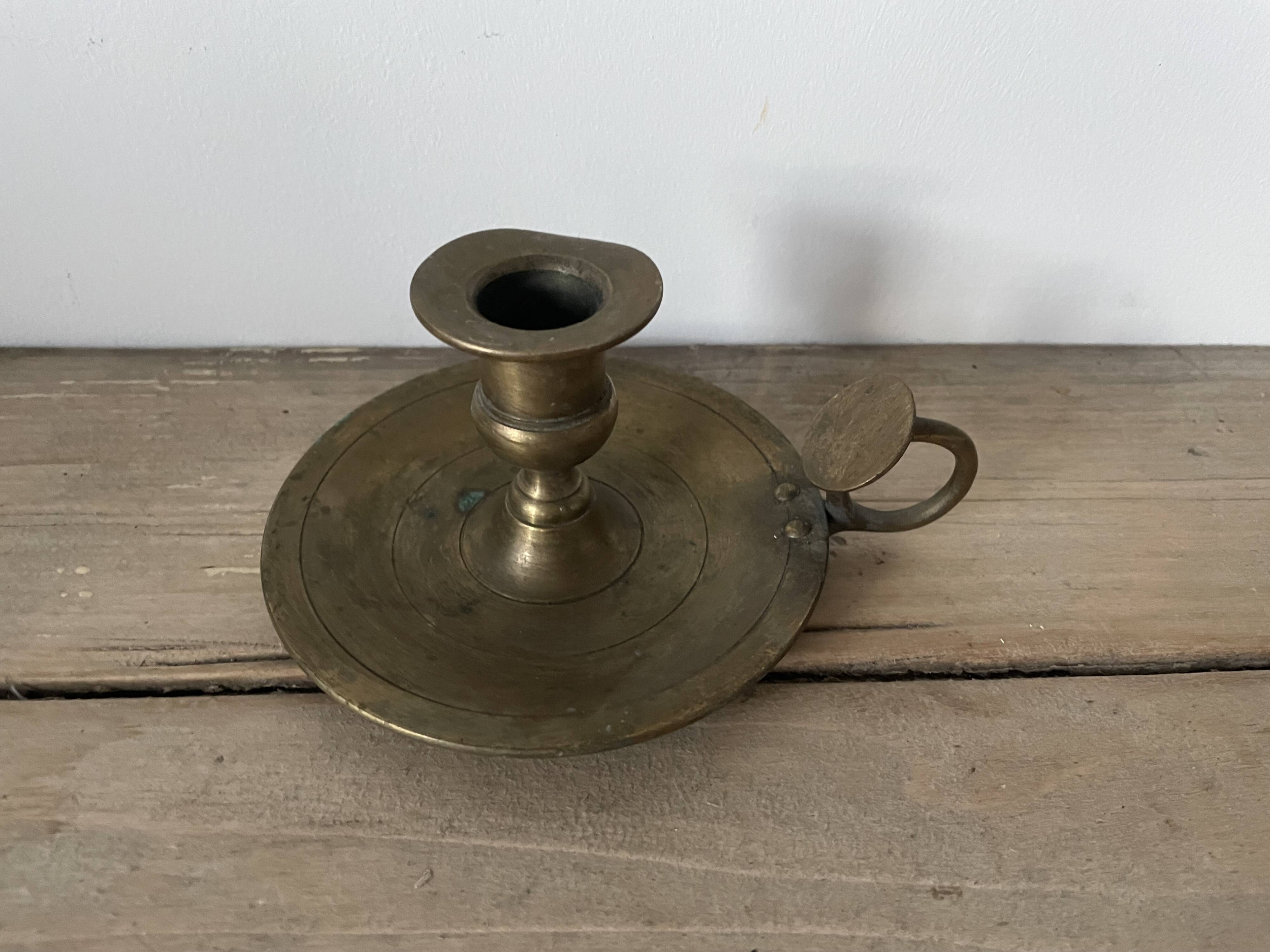 Old brass candle holder
