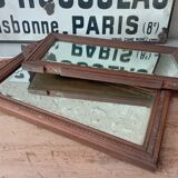 Set of two bevelled mirrors in moulded oak.