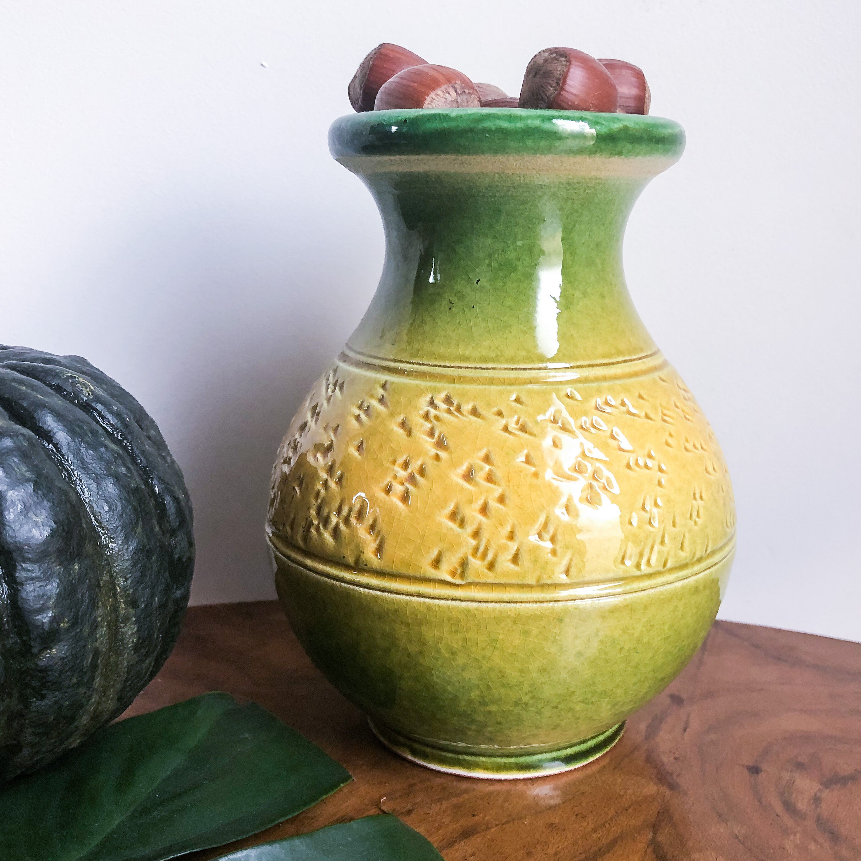 Yellow and green enamelled terracotta vase