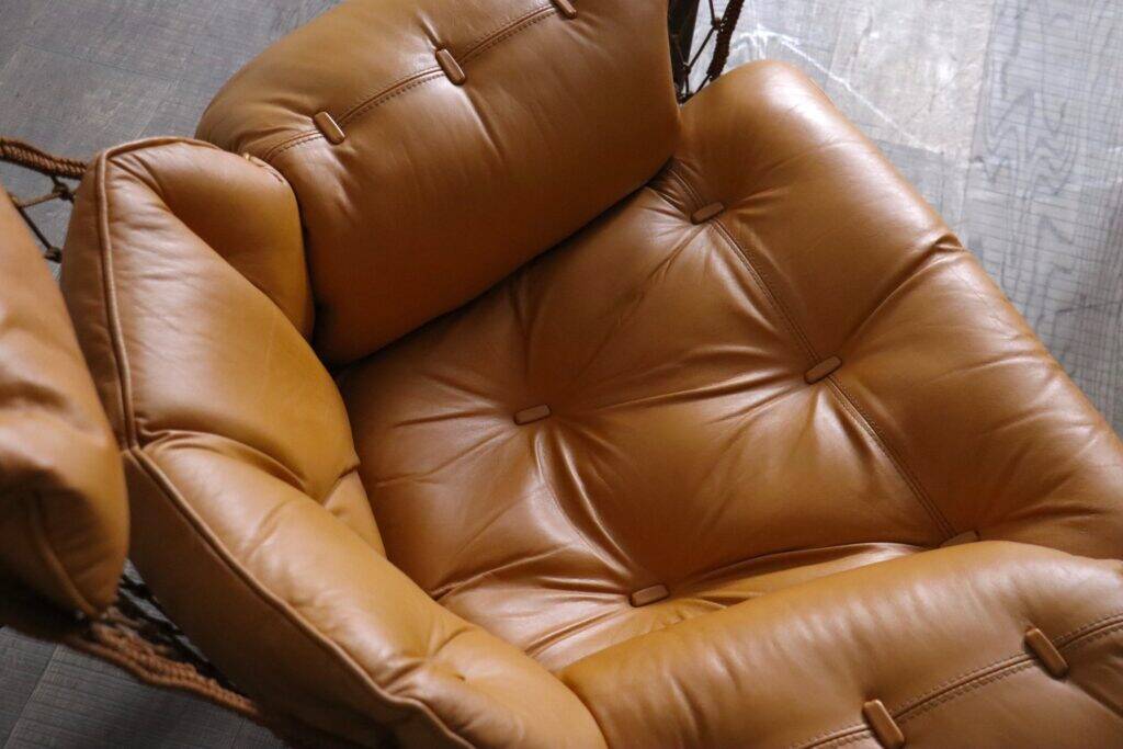 Jangada lounge chair with ottoman in cognac leather by Jean Gillon, Brazil, 1960s