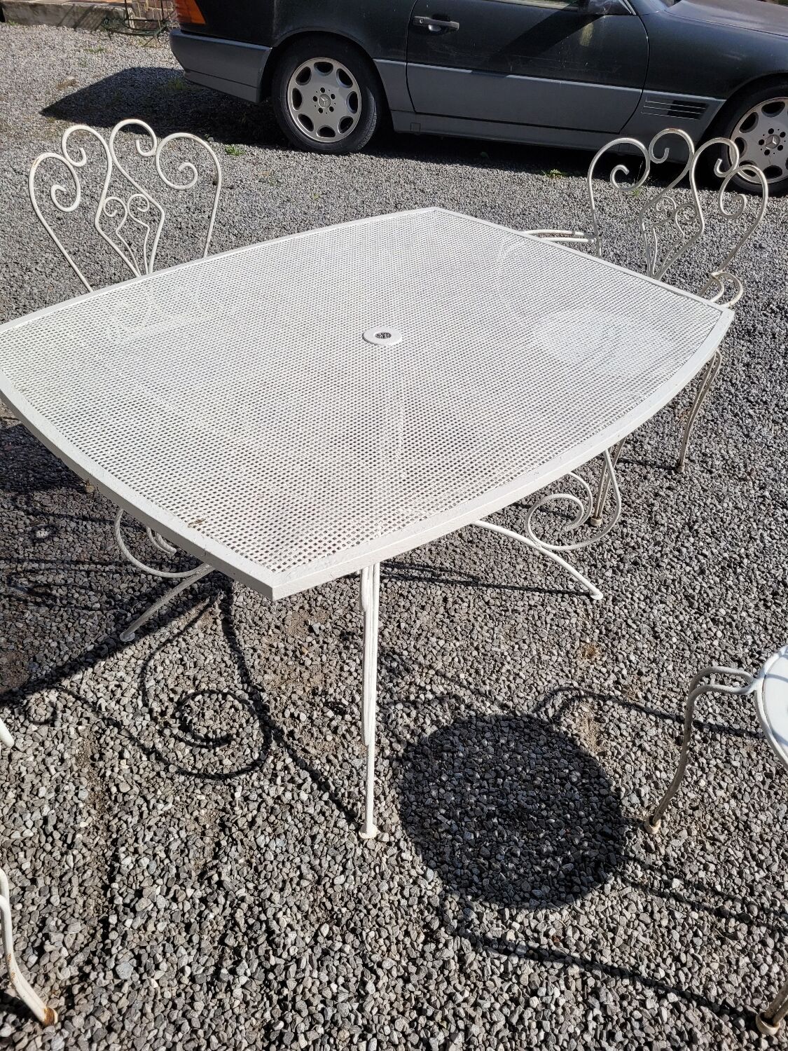 Old wrought iron garden furniture, table + 2 armchairs + 2 chairs