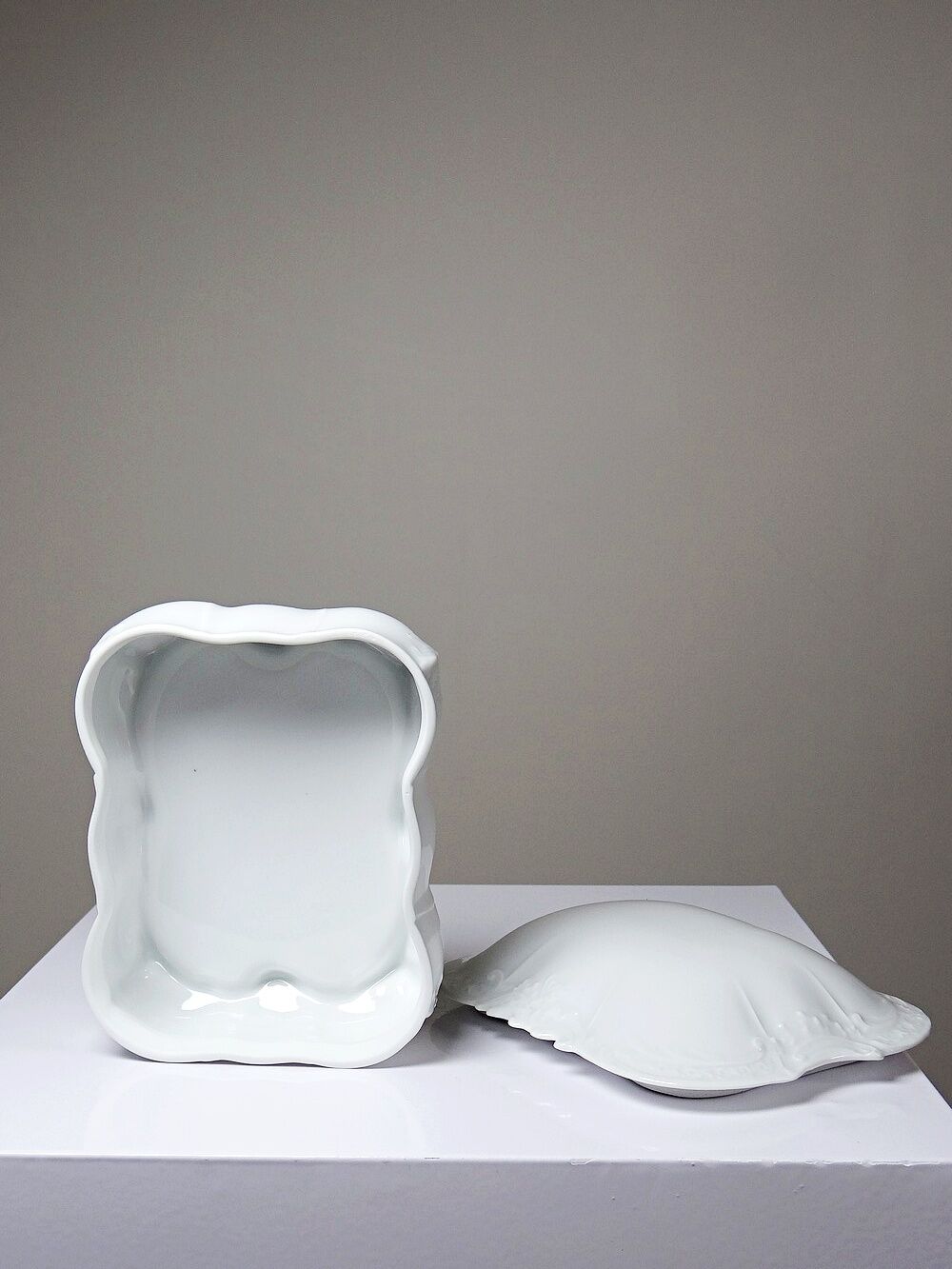 Vintage Limoges porcelain bonbonnière in white with rococo decoration.