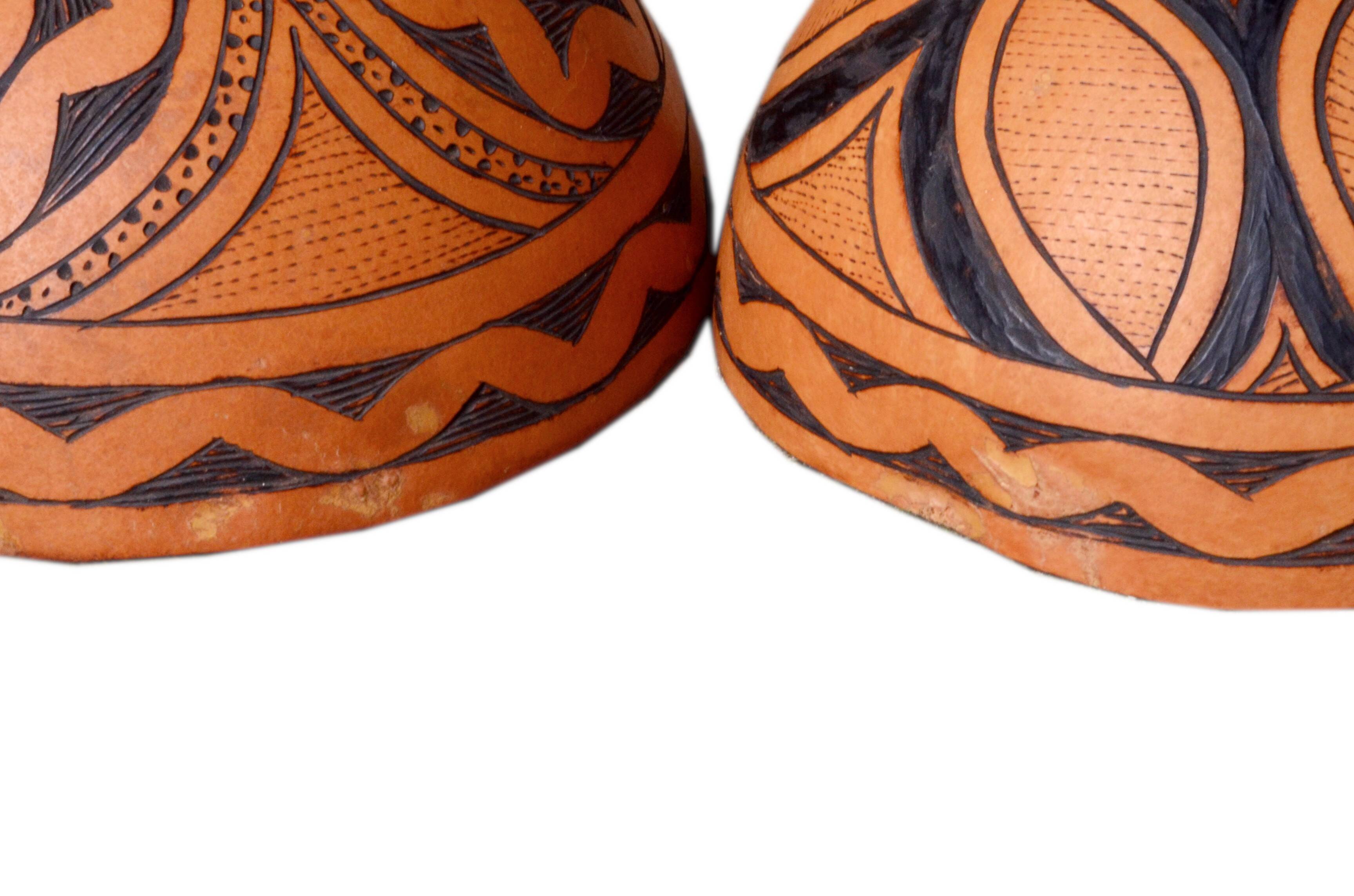 2 half decorated gourds (pyrography), floral and geometric patterns, 20cm