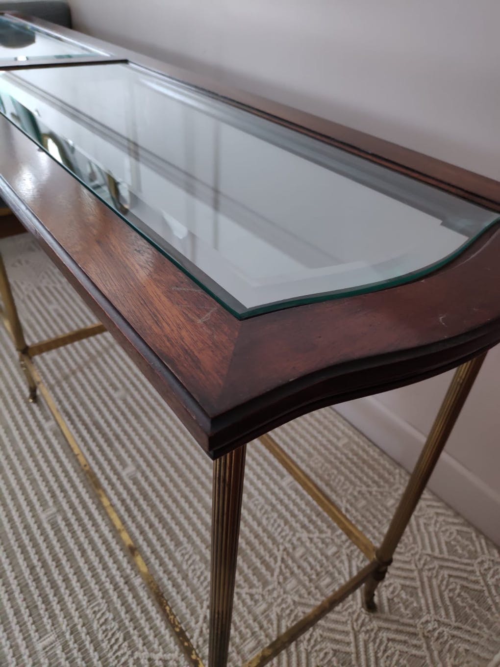 Glass and brass console table