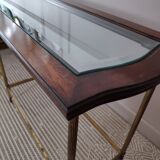 Glass and brass console table