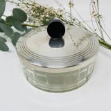 Vintage box made of chiseled glass and covered metal, taken in black Bakelite