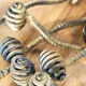 Set of six hammered Art Deco coat hooks