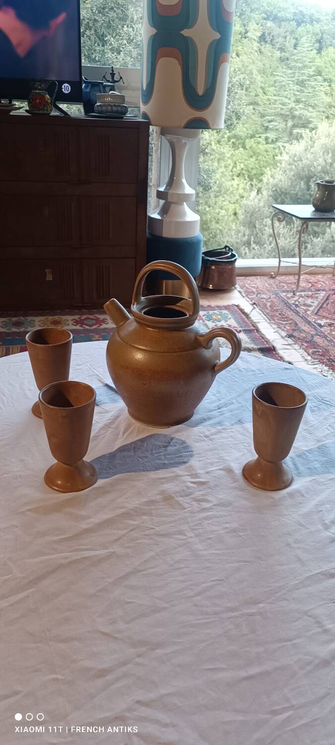 Iridescent carafe and 3 stoneware mazagrans from Digouin. Handmade work.