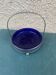 Vintage table basket in cobalt blue glass with a silver metal frame.