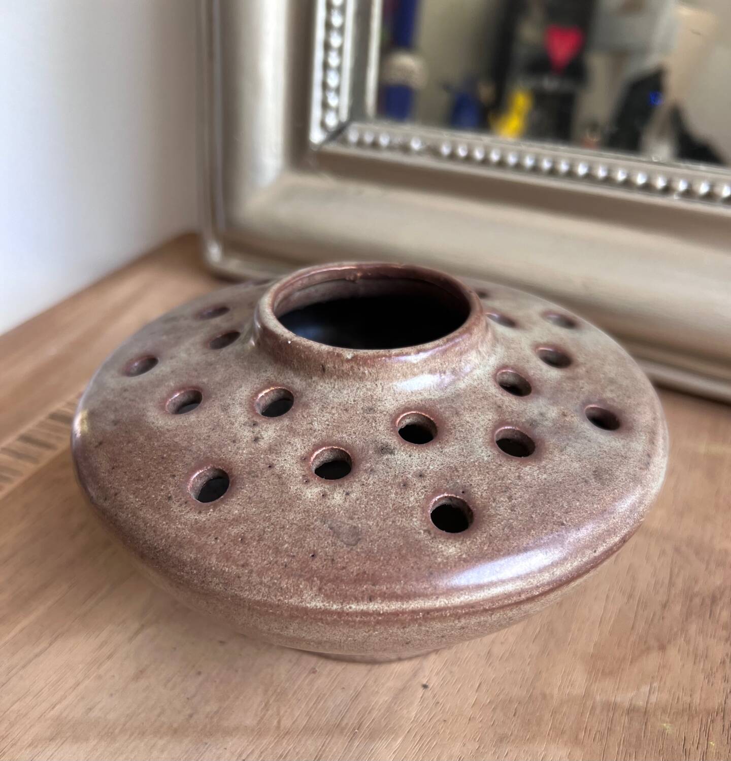 Vintage flower pot in perforated handcrafted stoneware, flattened round shape, p