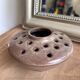 Vintage flower pot in perforated handcrafted stoneware, flattened round shape, p