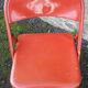 Red metal folding chair, 80s/90s