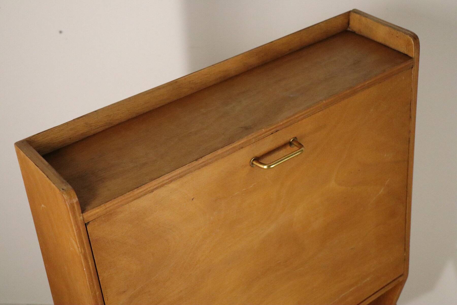 Vintage 1960s wooden secretary with metal legs.