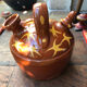 Orange glazed terracotta gargoulette