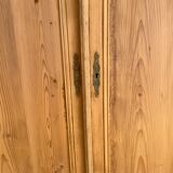 Vintage wardrobe in raw wood