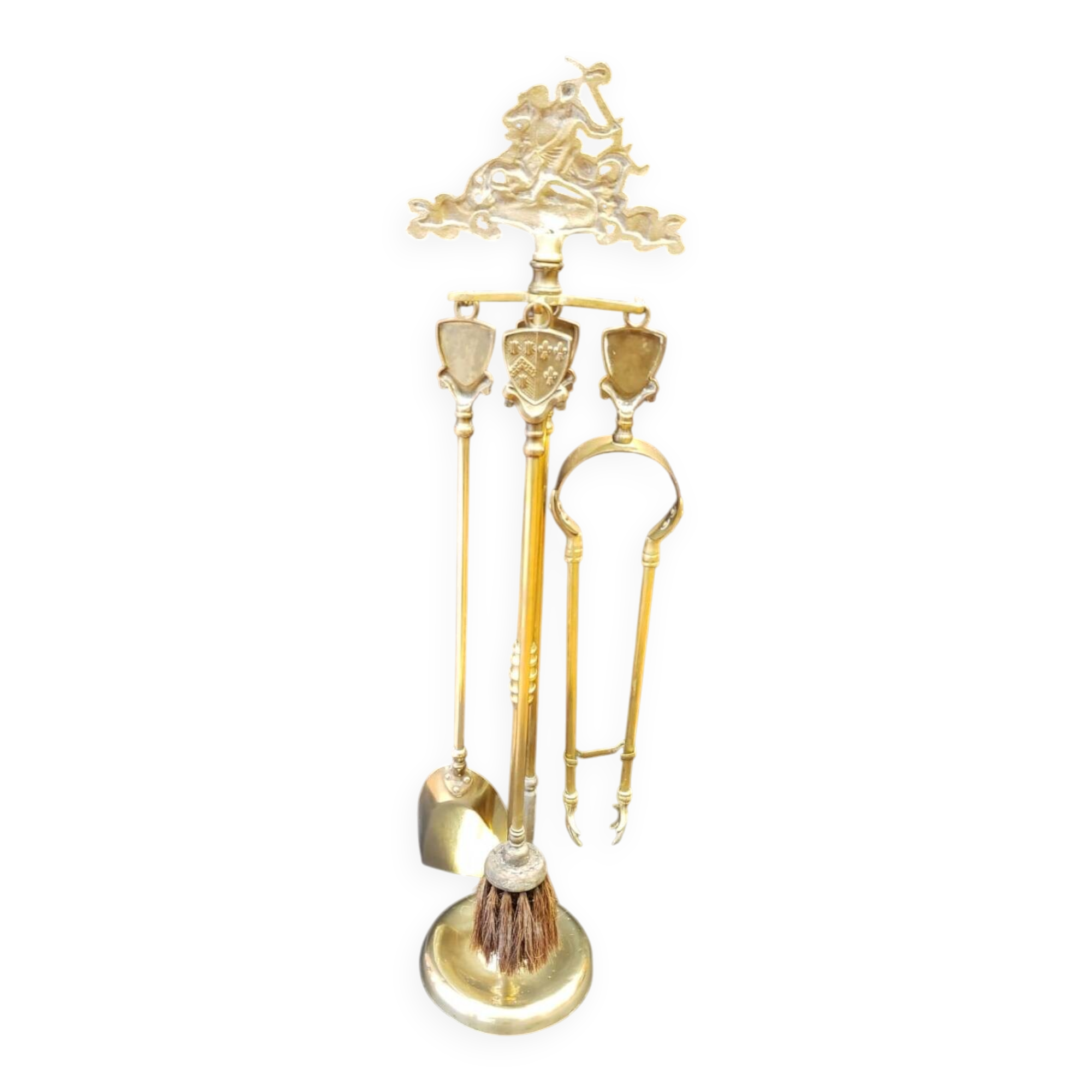 Brass fireplace set with 4 accessories.