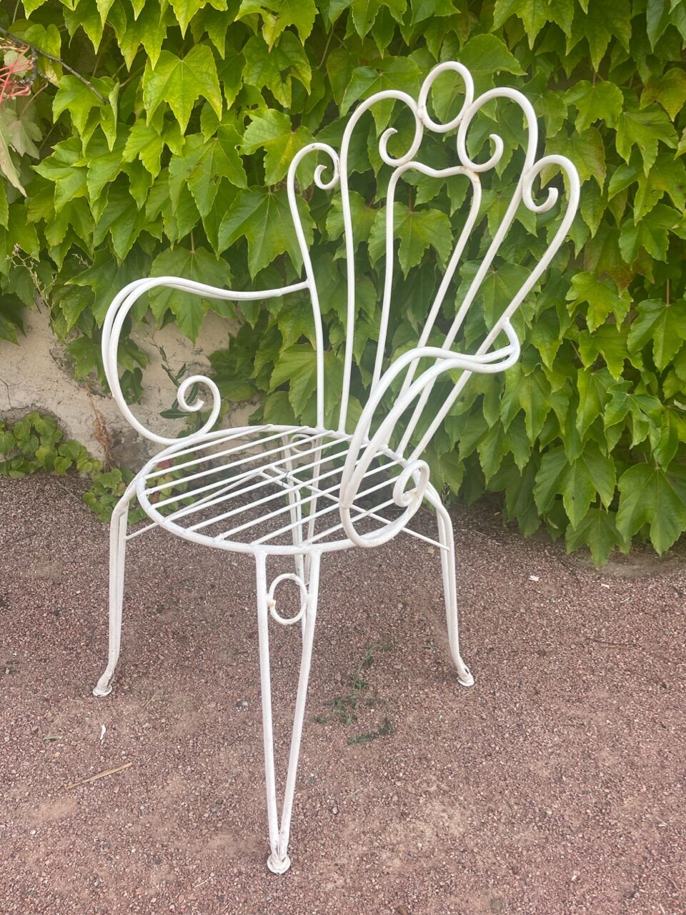Provençal wrought iron armchairs
