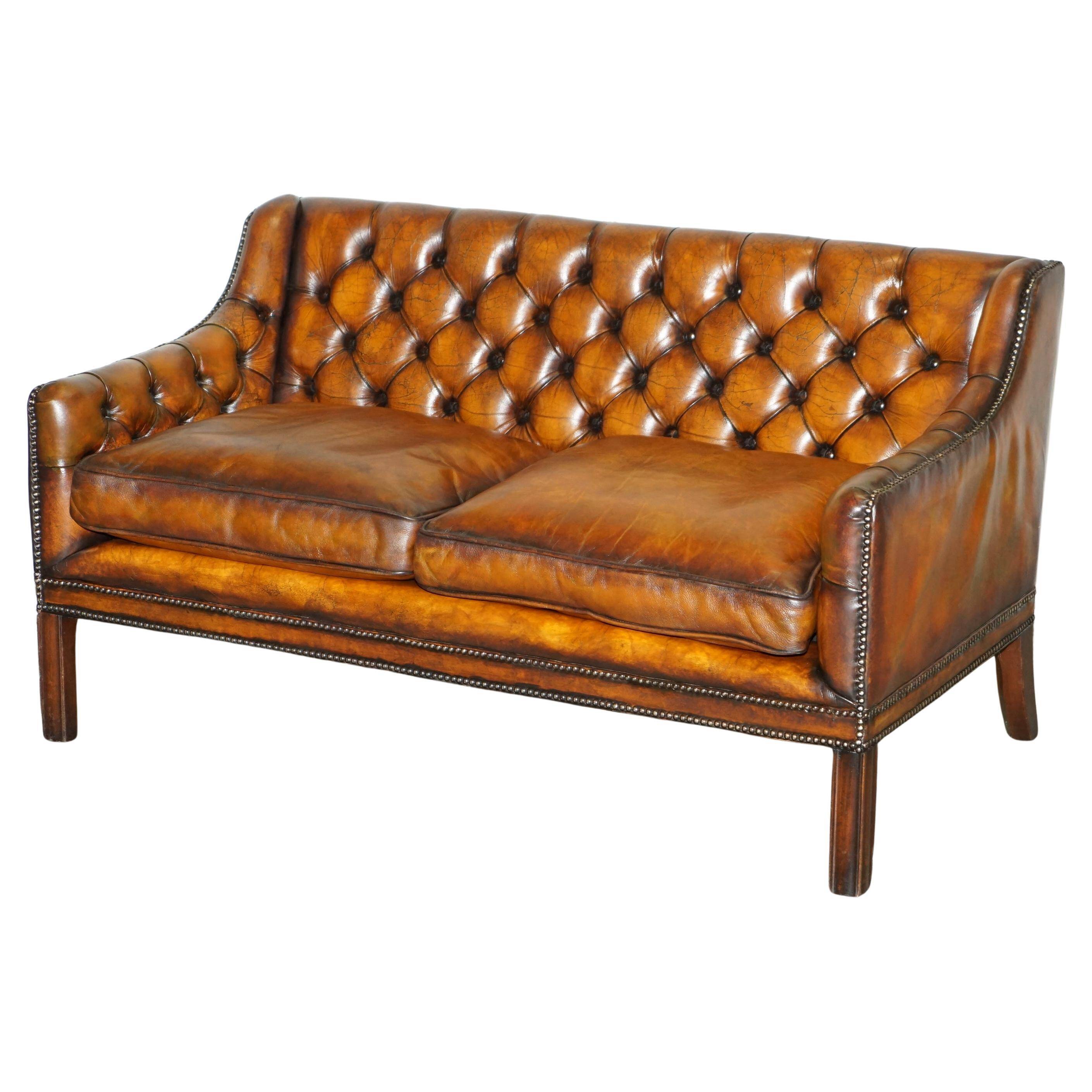 Restored leather Chesterfield sofa in Regency style