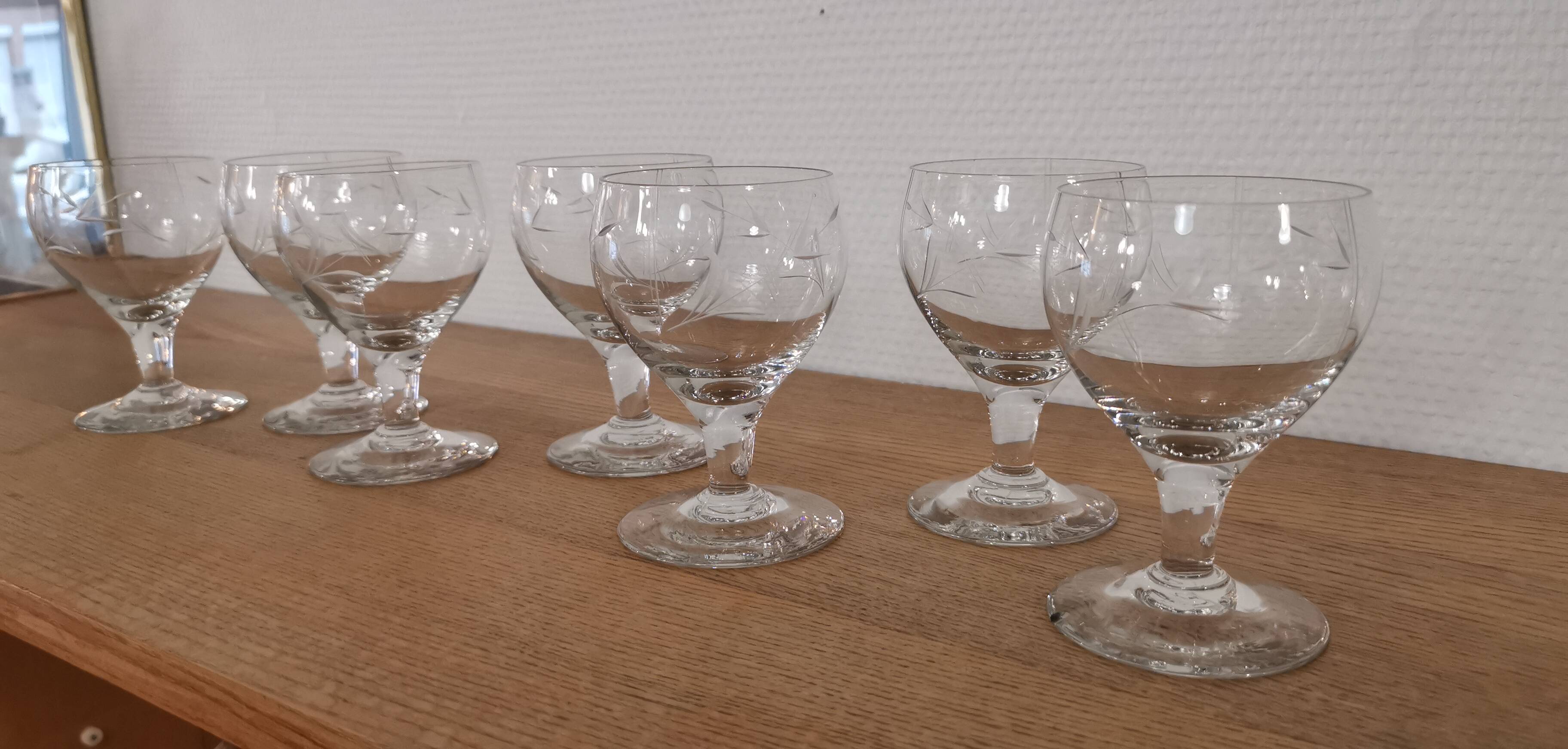 Set of 7 finely engraved vintage wine glasses