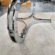 Chrome metal coffee table and oval smoked glass tray