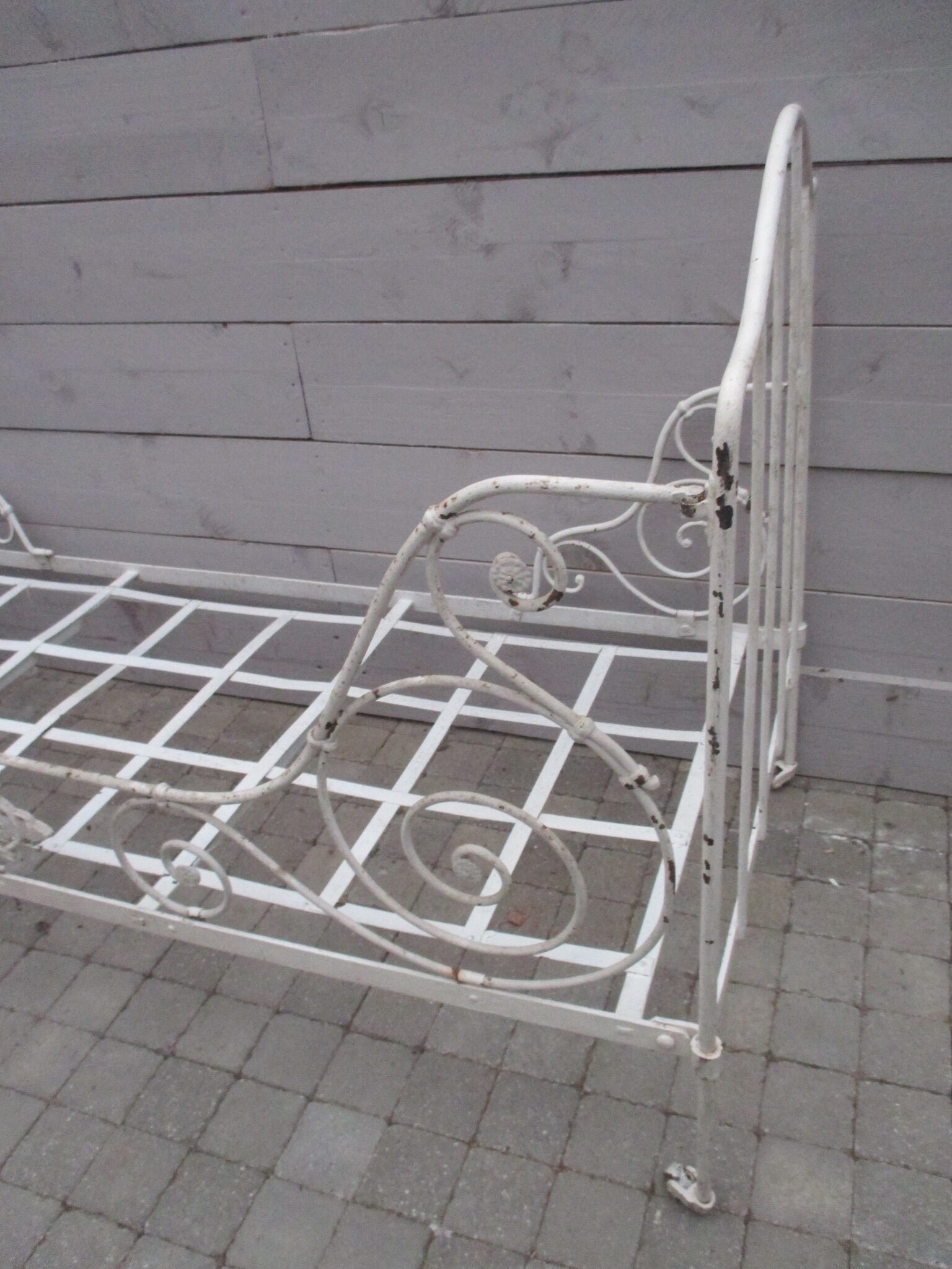 Folding wrought iron bed