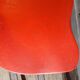 Lot of 2 wooden chairs and red skai