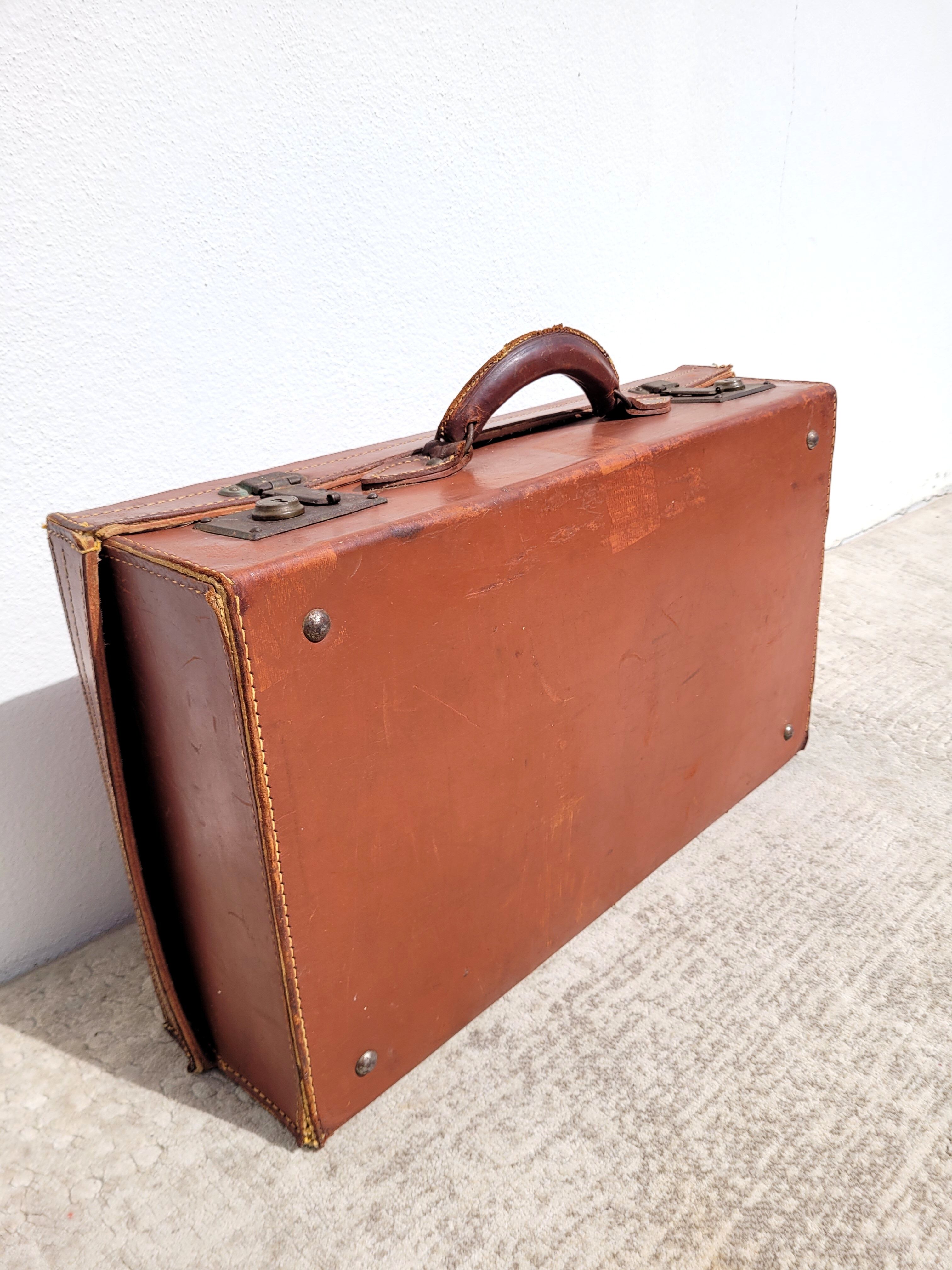 Old leather suitcase ASD
