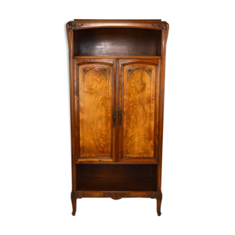 Art Nouveau bookcase carved in walnut and elm magnifying glass, circa 1905