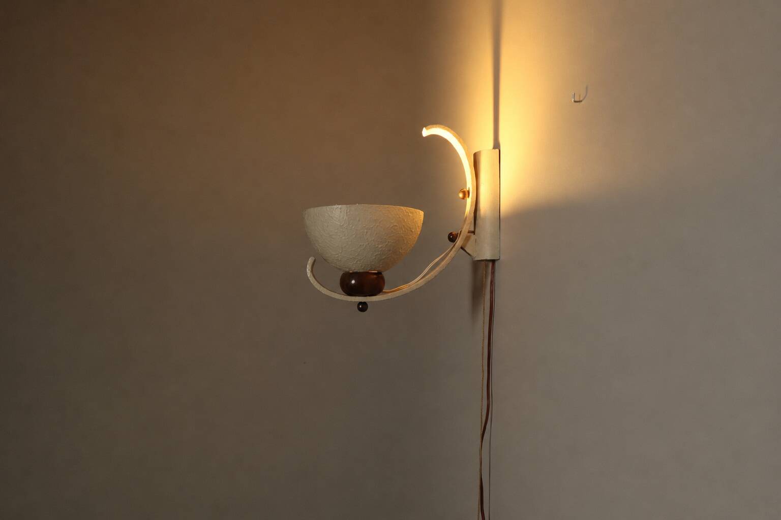 Pair of sculptural mid-century wall uplighters, circa 1950
