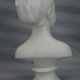 Buste Mademoiselle Brongniart, en biscuit blanc, sur socle rond