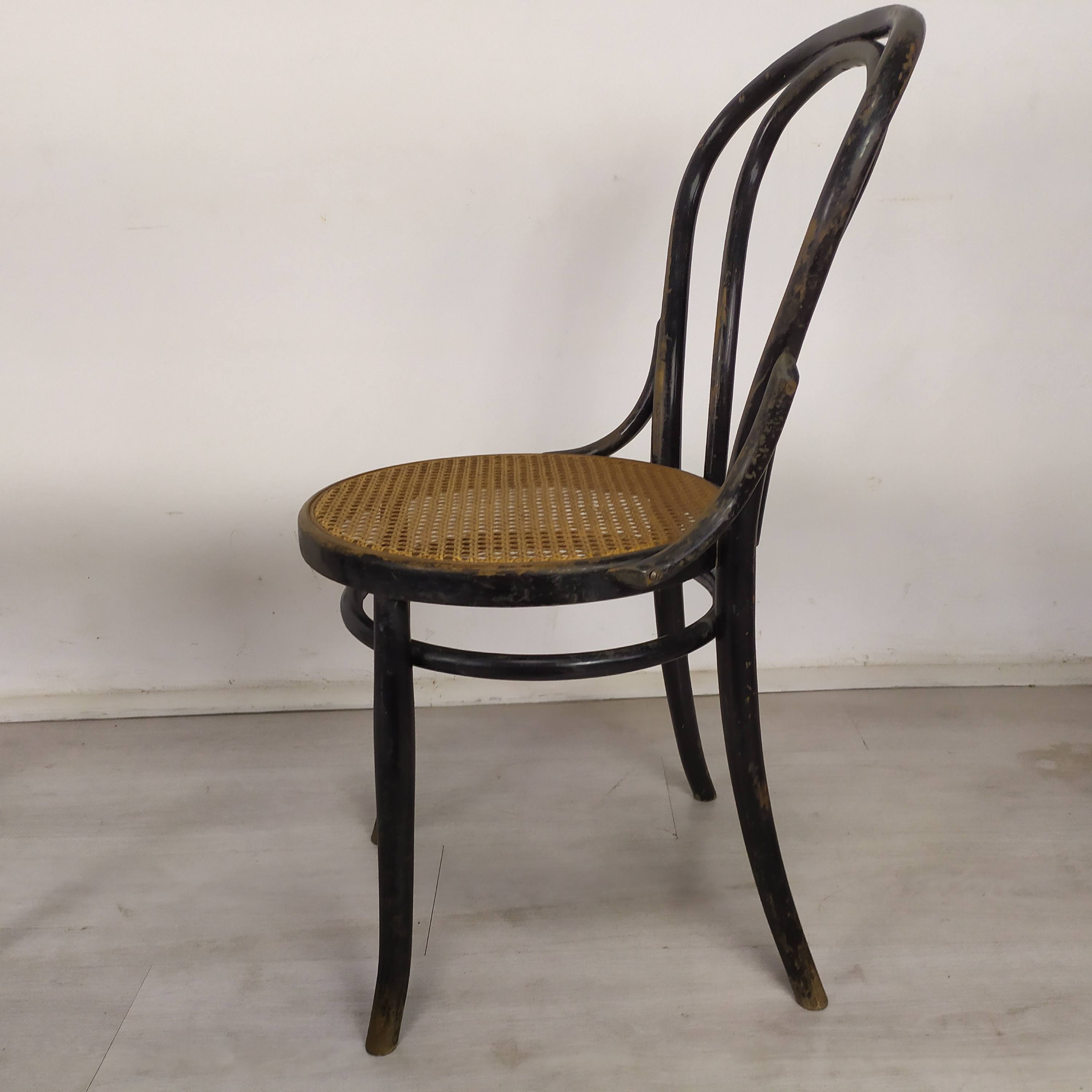 Black canned bistro chairs