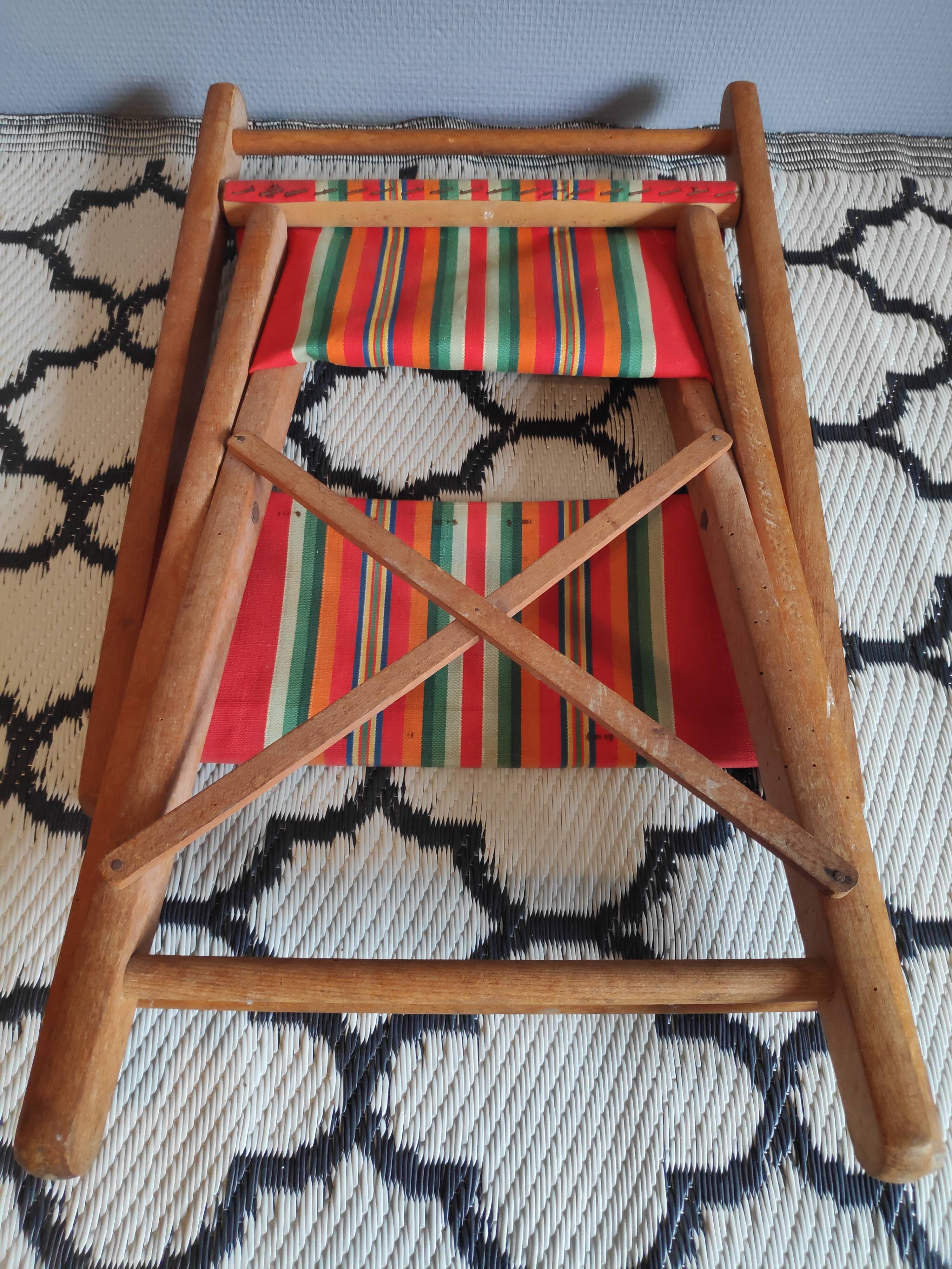 Vintage wooden folding chairs and basque fabric