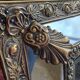 Napoleon III style mirror with gilt brass side panels