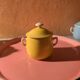 6 small porcelain cream pots from Limoges with a tray.