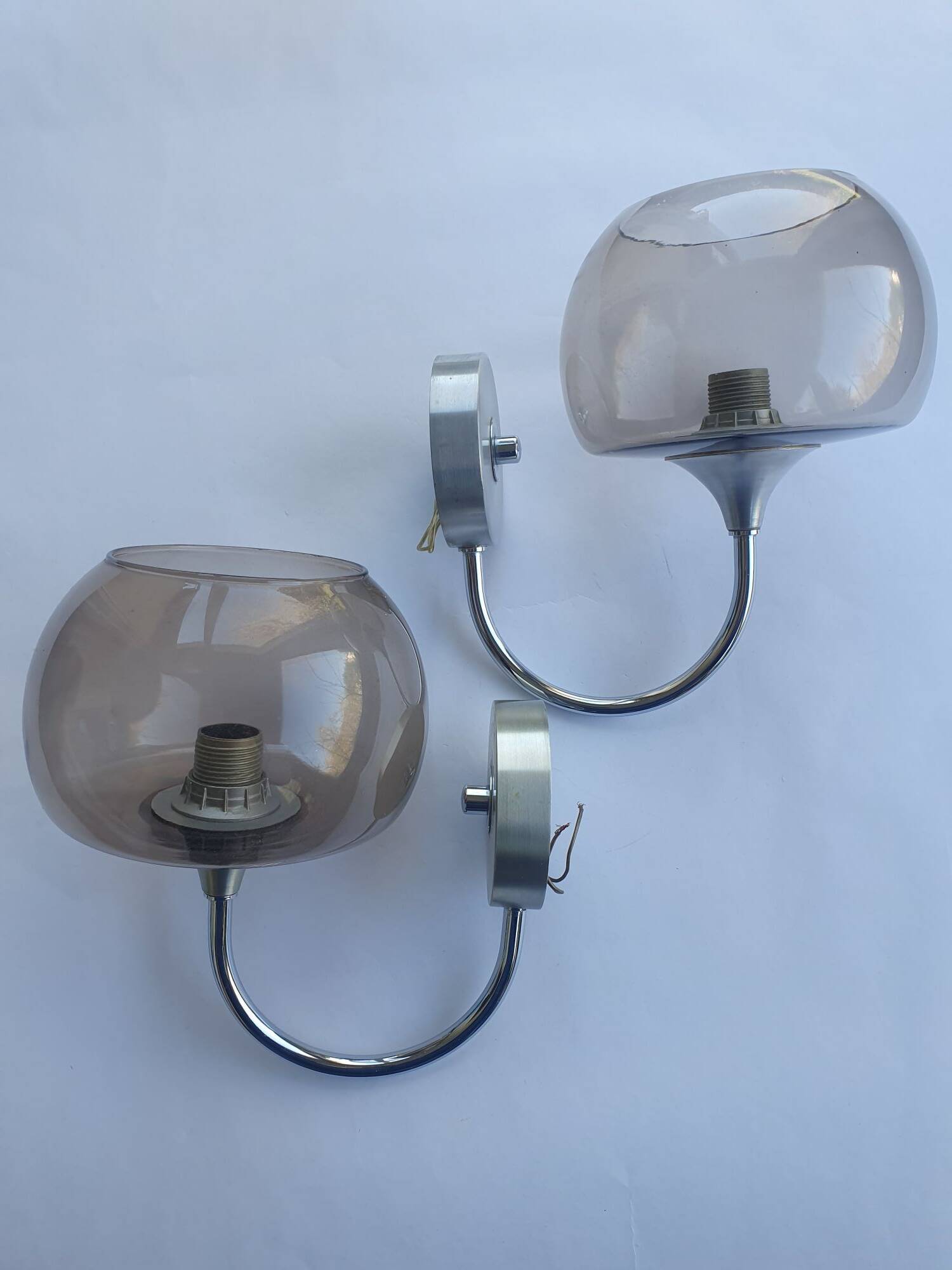 Pair of chrome metal and smoked glass wall lights from the 80s
