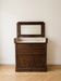 Antique wooden and marble dressing table from the early 20th century.